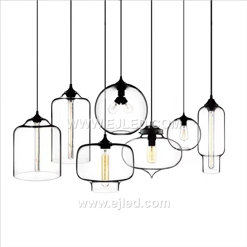 This single-lamp pendant light offers a unique ambient effect with its reflective, spherical glass shade. Model GL0044 suspends from a black fabric cord, projecting a distinct, semi-transparent quality when illuminated. - view 2