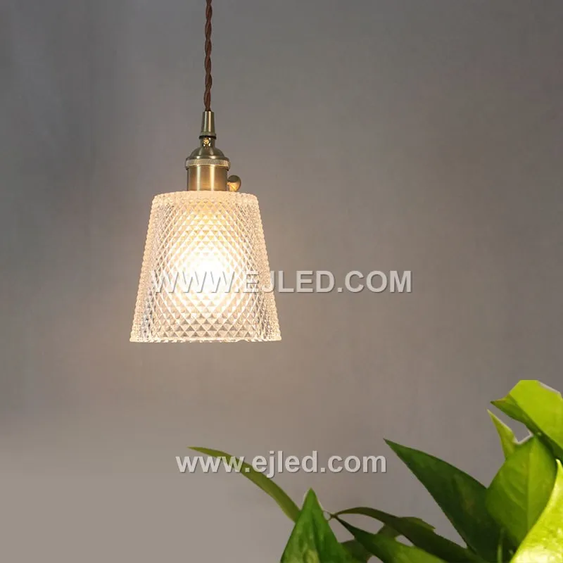 Model GL0101 is a single-lamp glass pendant light designed with a clear, vertically ribbed shade. The transparent, textured glass directs light downwards while adding visual interest. - view 2