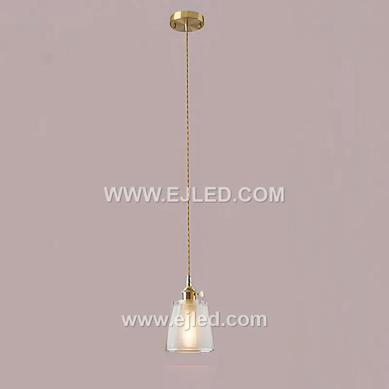 Model GL0101 is a single-lamp glass pendant light designed with a clear, vertically ribbed shade. The transparent, textured glass directs light downwards while adding visual interest. - view 3