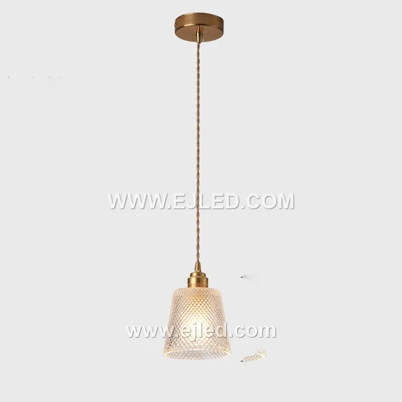 Model GL0101 is a single-lamp glass pendant light designed with a clear, vertically ribbed shade. The transparent, textured glass directs light downwards while adding visual interest. - view 5