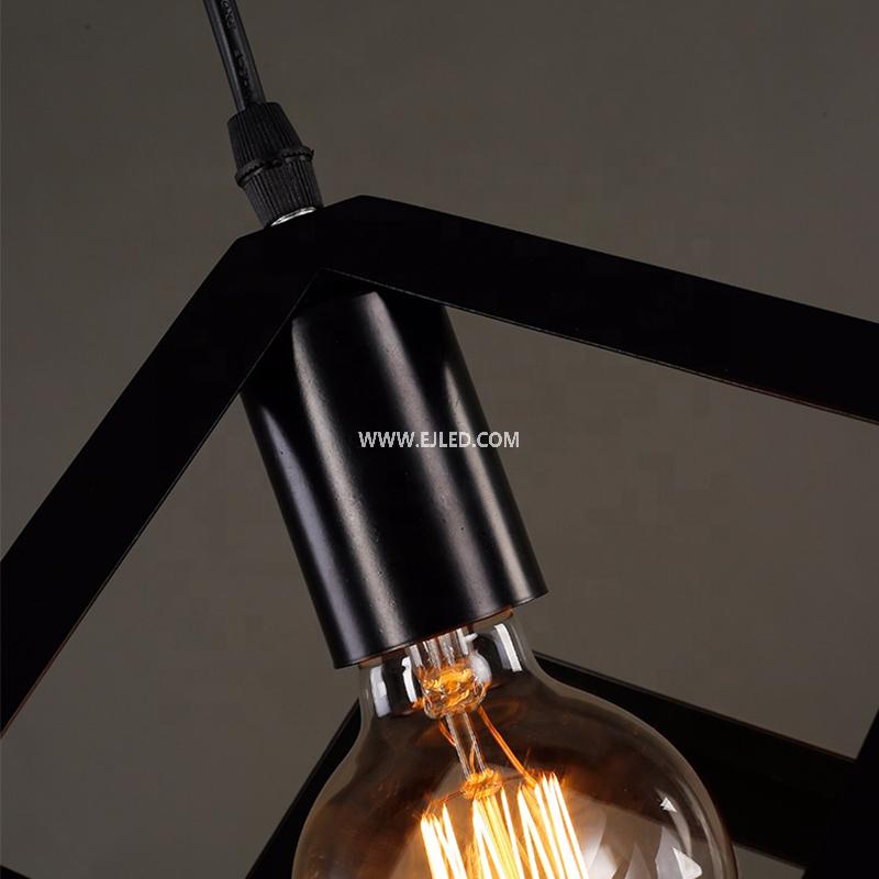 This IN0008 steel pendant light presents an open cube cage design, finished in matte black, with a single E27 lamp holder inside. It hangs from an adjustable black cable and round ceiling plate. - view 2