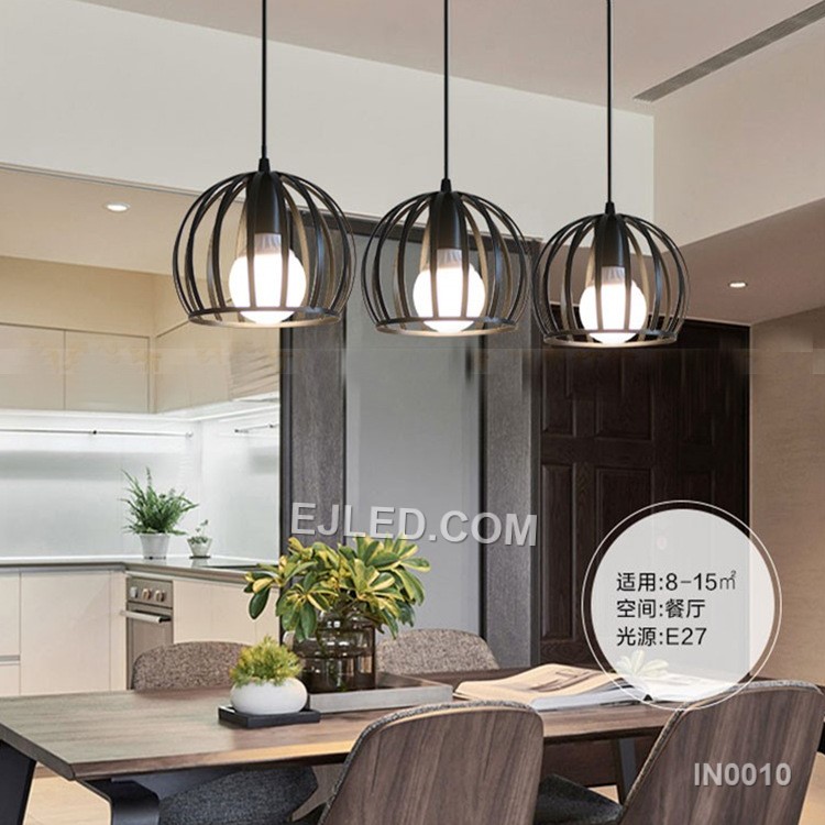 This IN0010 iron pendant light features a solid, semi-circular dome shade with a matte black exterior and white interior, holding a single E27 lamp. It hangs by a black cable. - view 6