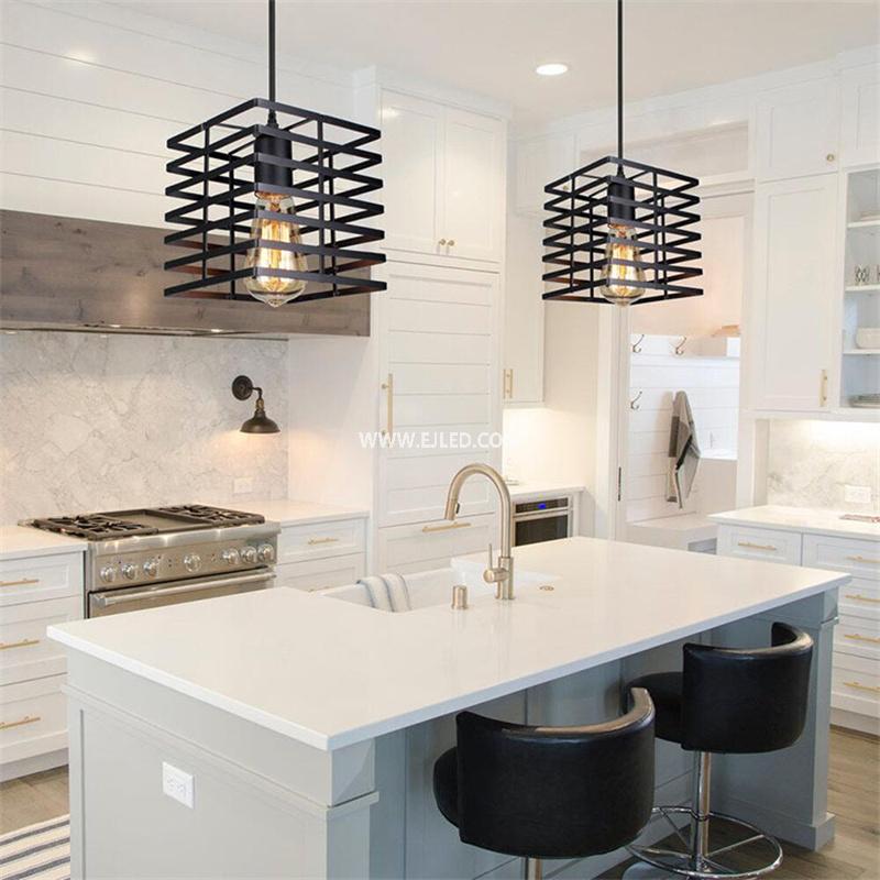 This square-shaped pendant light features an open wire cage in black, housing a single exposed lamp. Its compact proportions are well-suited for smaller rooms or installations in a series over kitchen islands or bars. - view 4