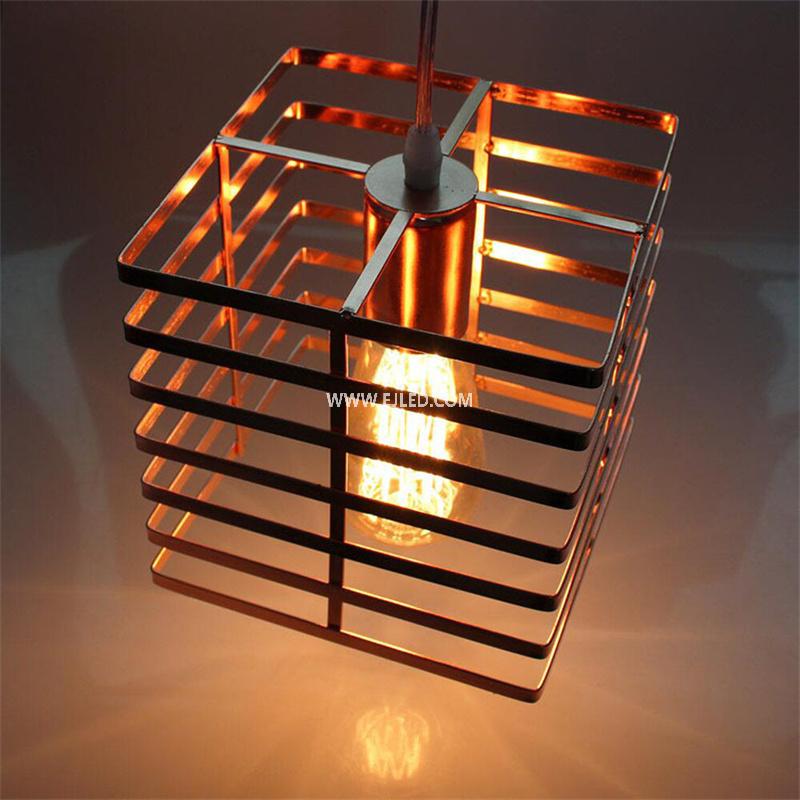 This square-shaped pendant light features an open wire cage in black, housing a single exposed lamp. Its compact proportions are well-suited for smaller rooms or installations in a series over kitchen islands or bars. - view 2