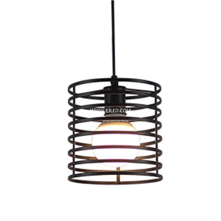 This cylindrical pendant light distinguishes itself with a unique spring coil design, crafted from black-finished iron. Its single, exposed lamp holder provides direct illumination while making the bulb a visual feature. - view 2