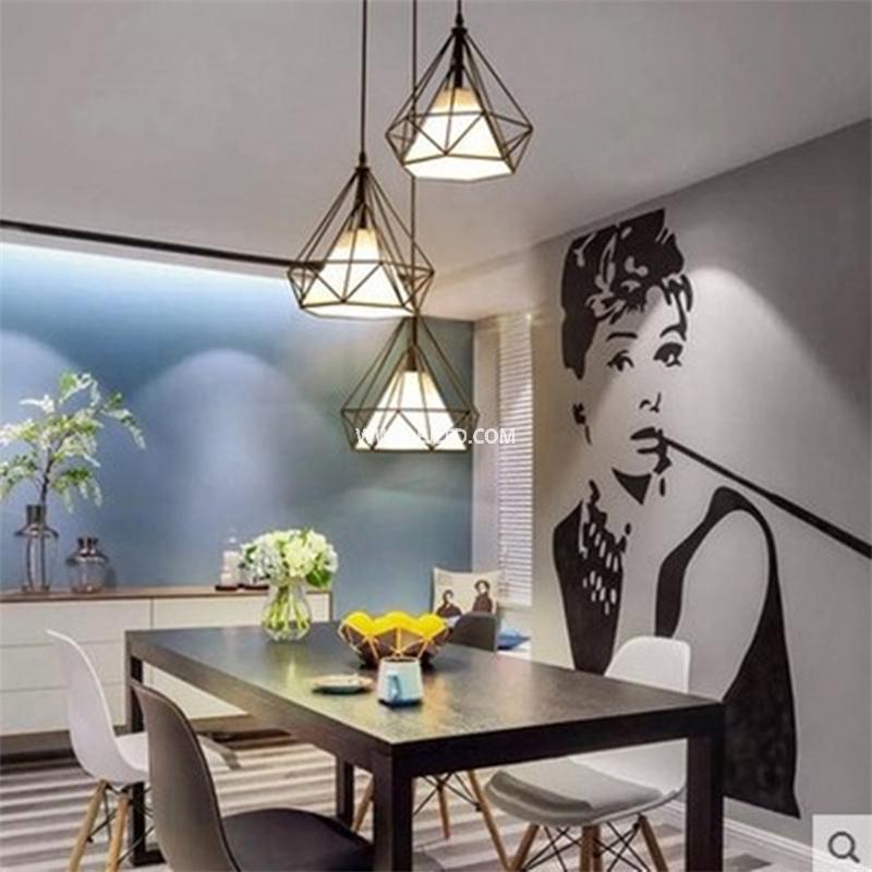 This single-lamp pendant light features a D25 diamond-shaped cage constructed from black powder-coated steel. Its open design allows for ambient light distribution, making it suitable for various commercial or hospitality settings. - view 6