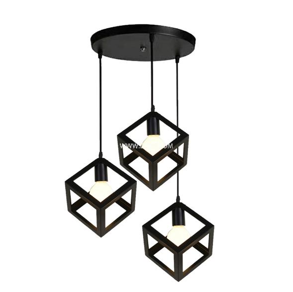 This IN0008 steel pendant light presents an open cube cage design, finished in matte black, with a single E27 lamp holder inside. It hangs from an adjustable black cable and round ceiling plate. - view 4