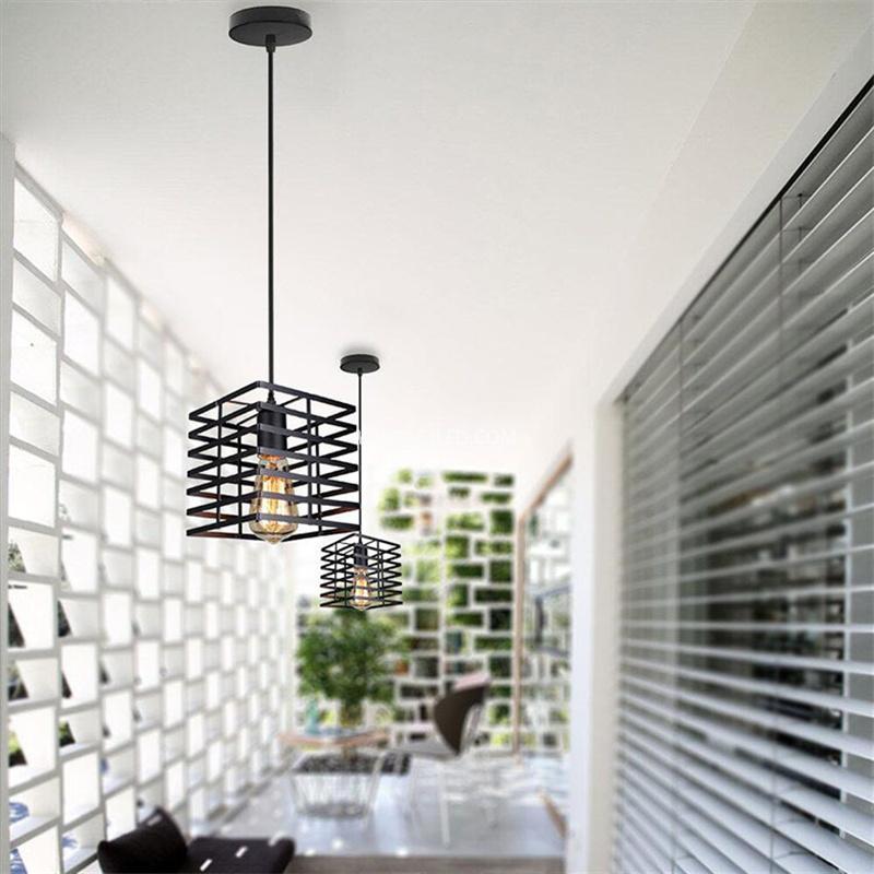 This square-shaped pendant light features an open wire cage in black, housing a single exposed lamp. Its compact proportions are well-suited for smaller rooms or installations in a series over kitchen islands or bars. - view 5