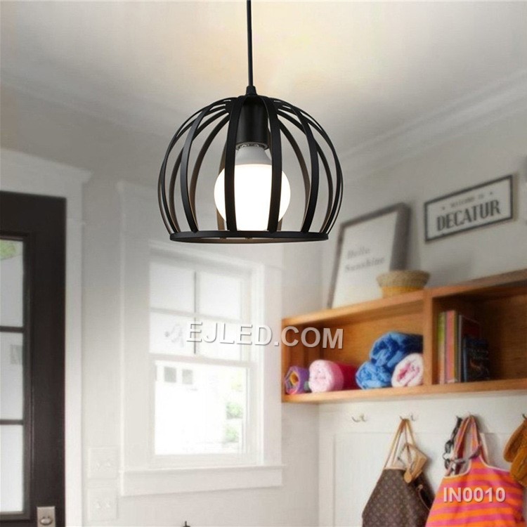 This IN0010 iron pendant light features a solid, semi-circular dome shade with a matte black exterior and white interior, holding a single E27 lamp. It hangs by a black cable. - view 3