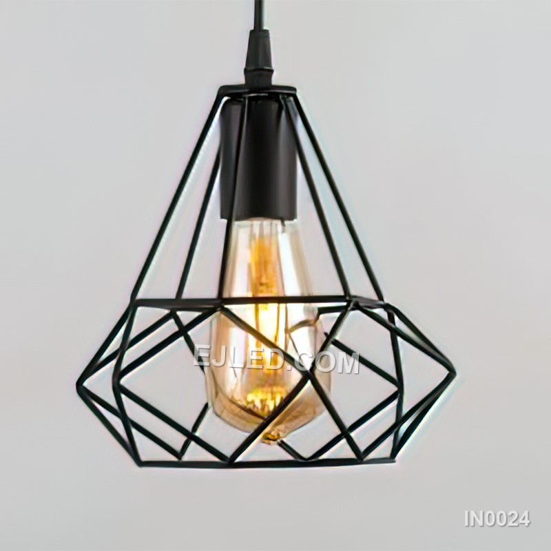 A single black iron pendant light, model IN0024, features an open diamond-shaped cage. Its geometric lines create a distinct silhouette, allowing light to spread freely from the enclosed lamp holder, suspended by a black cable. - view 2