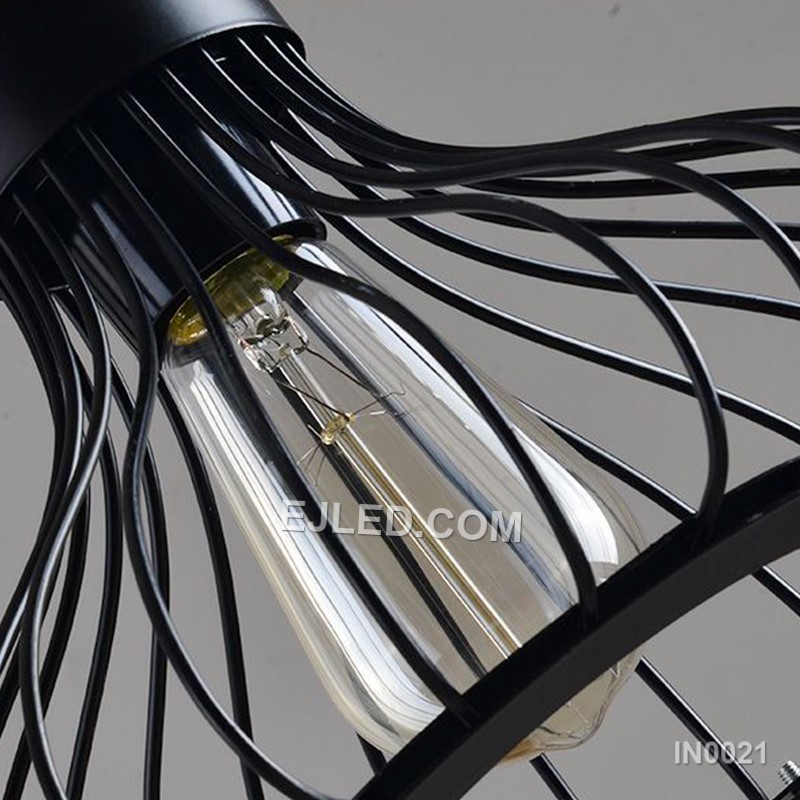 The IN0021 pendant light’s open, petal-like iron cage design allows for broad, unimpeded light distribution. Its black finish frames a single lamp, making it ideal for showcasing decorative bulbs while providing generous ambient light. - view 3