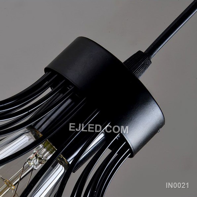 The IN0021 pendant light’s open, petal-like iron cage design allows for broad, unimpeded light distribution. Its black finish frames a single lamp, making it ideal for showcasing decorative bulbs while providing generous ambient light. - view 2