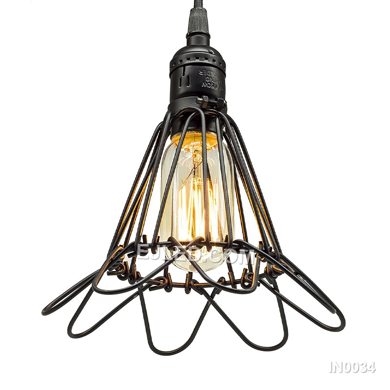 Iron forms the flared cylindrical cage of this pendant light, finished in a durable black powder coat. Its open structure and single exposed lamp are designed for direct, unobstructed illumination.