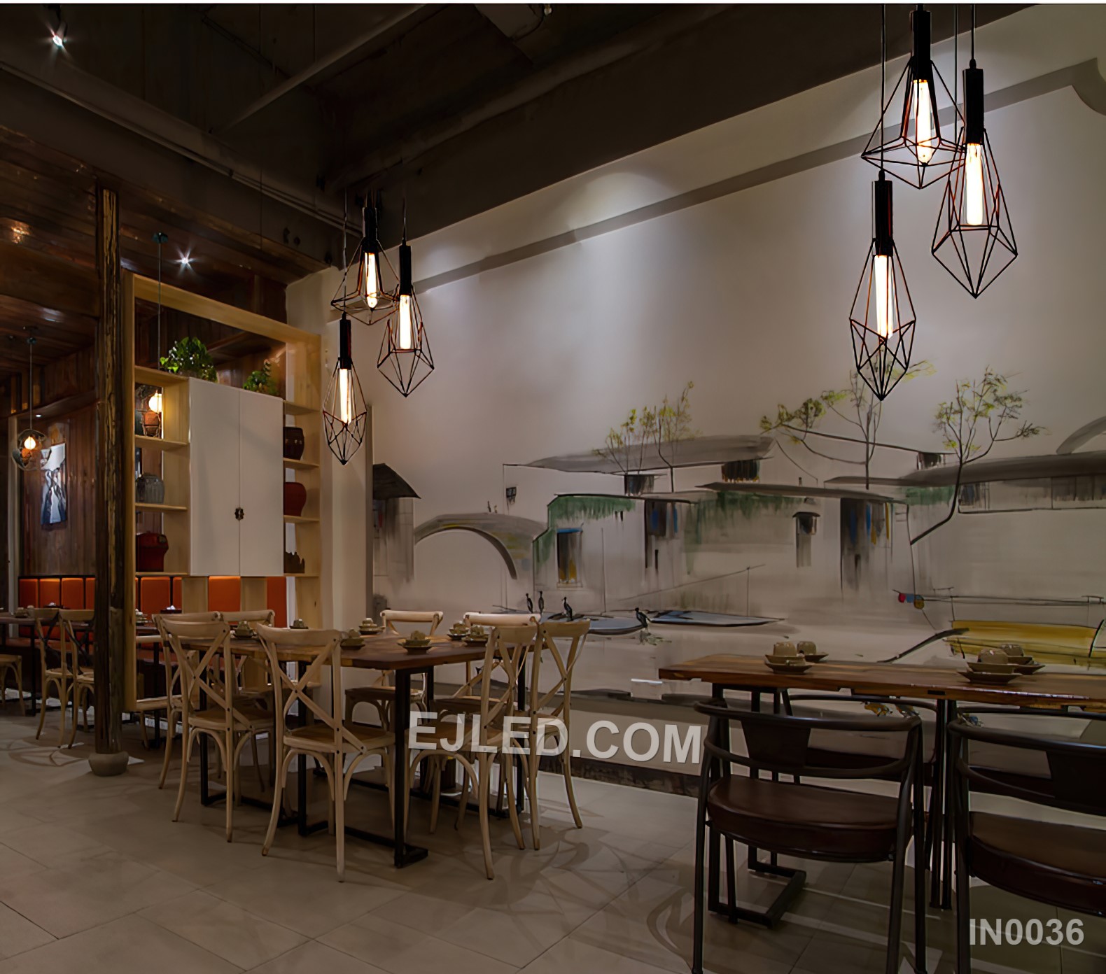 Three diamond-shaped cages, each constructed from black-finished iron rods, form the striking IN0036 pendant light. Suspended at varied heights from a single canopy, these open fixtures provide focused illumination and a strong visual statement. - view 2