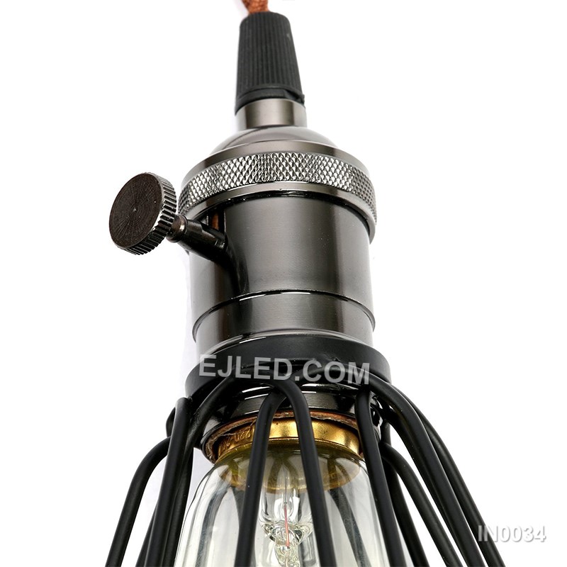 Iron forms the flared cylindrical cage of this pendant light, finished in a durable black powder coat. Its open structure and single exposed lamp are designed for direct, unobstructed illumination. - view 6