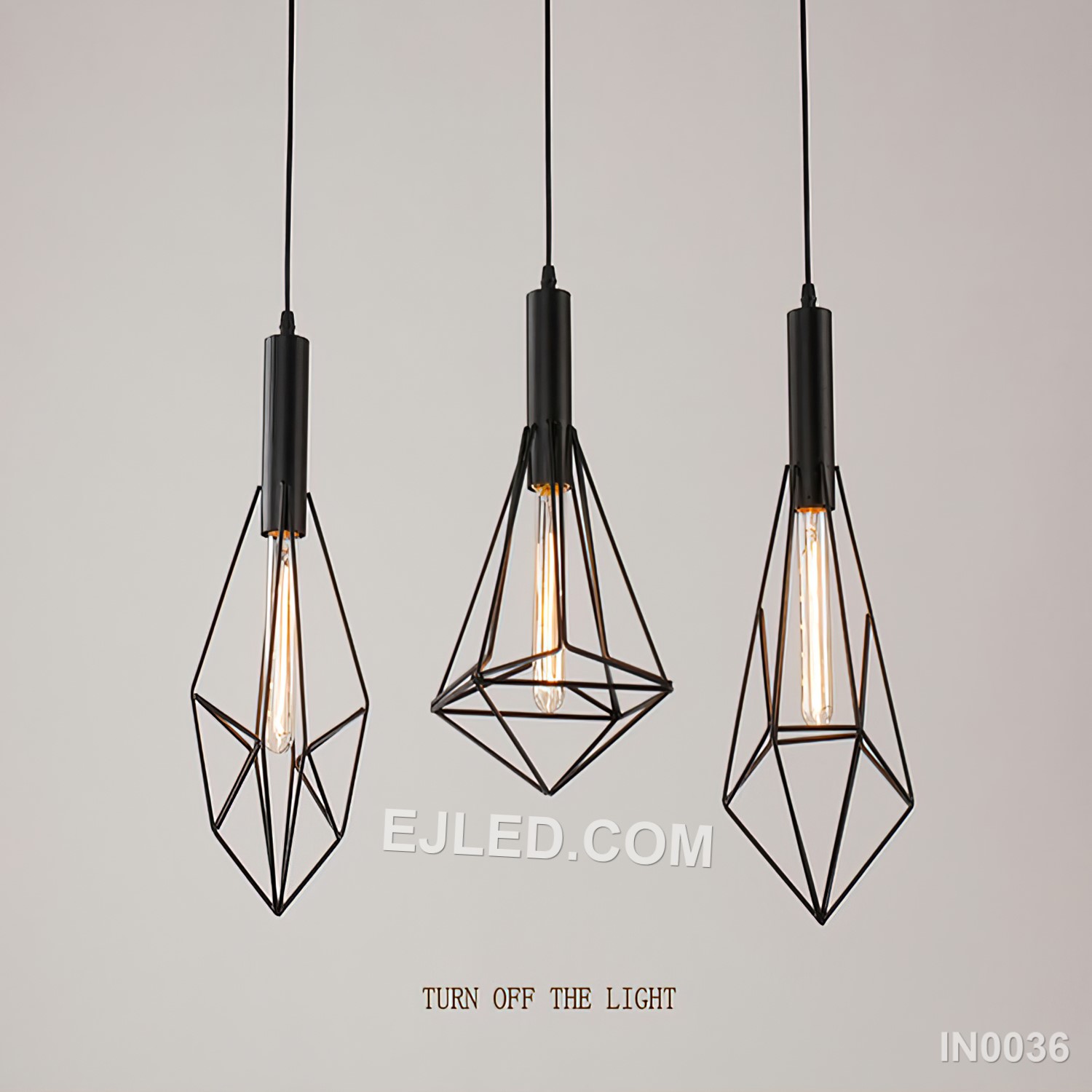 Three diamond-shaped cages, each constructed from black-finished iron rods, form the striking IN0036 pendant light. Suspended at varied heights from a single canopy, these open fixtures provide focused illumination and a strong visual statement. - view 4