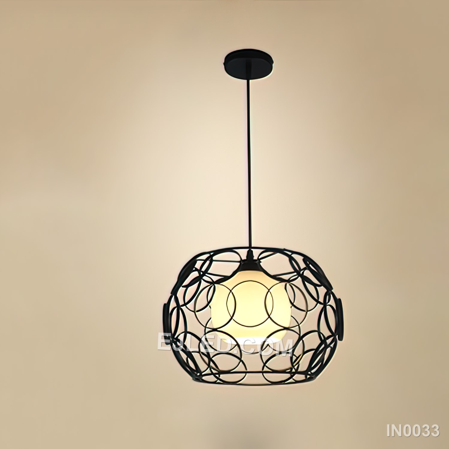 Suited for diverse settings, this drum-shaped pendant light features a black powder-coated iron cage enveloping an inner frosted glass sphere. This combination provides both ambient glow and a defined industrial aesthetic. - view 4