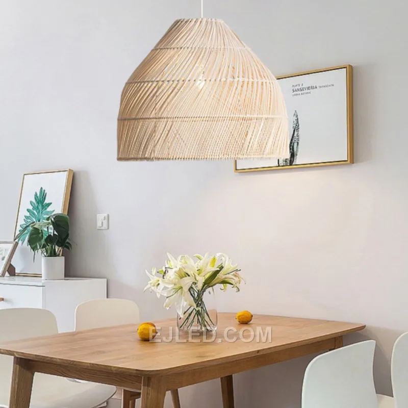 This RT0027 rattan pendant, with its tall and narrow bell profile, provides a consistent, diffused glow from its open-weave construction, suitable for various settings. - view 2