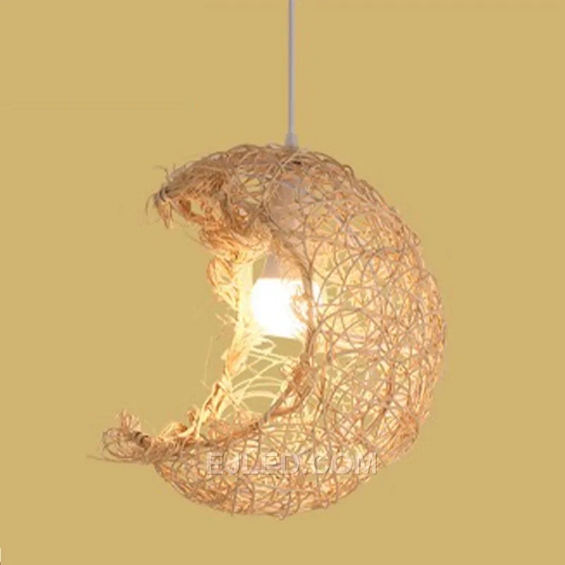 The RT0019 is a drum-shaped rattan pendant featuring a distinct open weave at the bottom, allowing for a focused downward light while casting diffuse ambient illumination through its sides. It hangs from a simple cable.