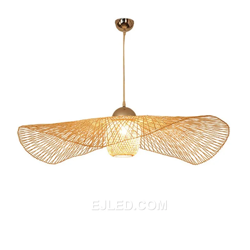 This bamboo pendant stands out with its unique, waisted bell silhouette, offering a departure from conventional dome or basket designs. Its dense weave directs light primarily downwards.