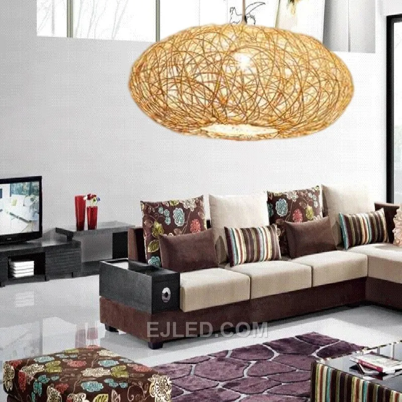 For spaces requiring soft, diffuse illumination, the spherical RT0004 pendant, woven from natural rattan, creates an inviting glow. Its open weave allows the light source to contribute to its visual appeal. - view 2
