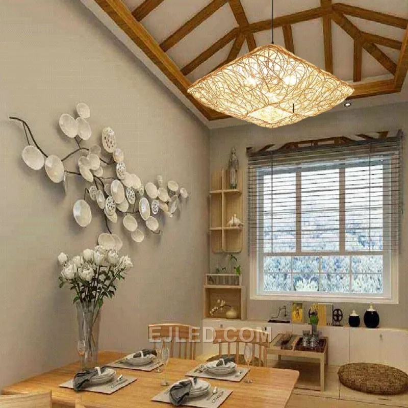 The RT0003 cuboid pendant, hand-woven from natural rattan, projects a warm, ambient light. Its distinct square profile makes it suitable for counter lighting or grouped installations. - view 2