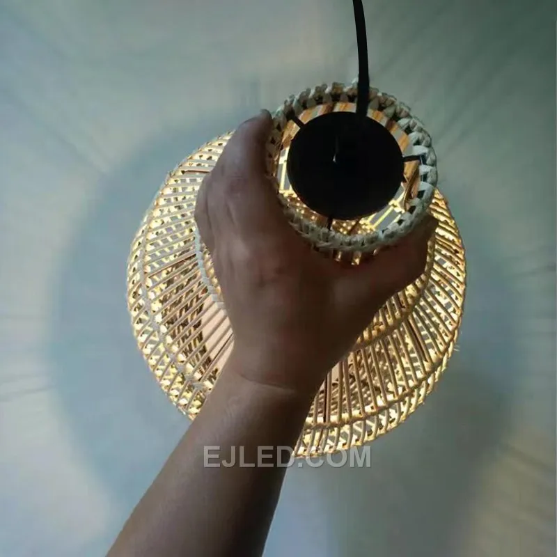 The RT0010 bell-shaped pendant, hand-woven from natural bamboo, offers a versatile design. It provides a warm, diffused glow suitable for various hospitality and commercial settings. - view 5