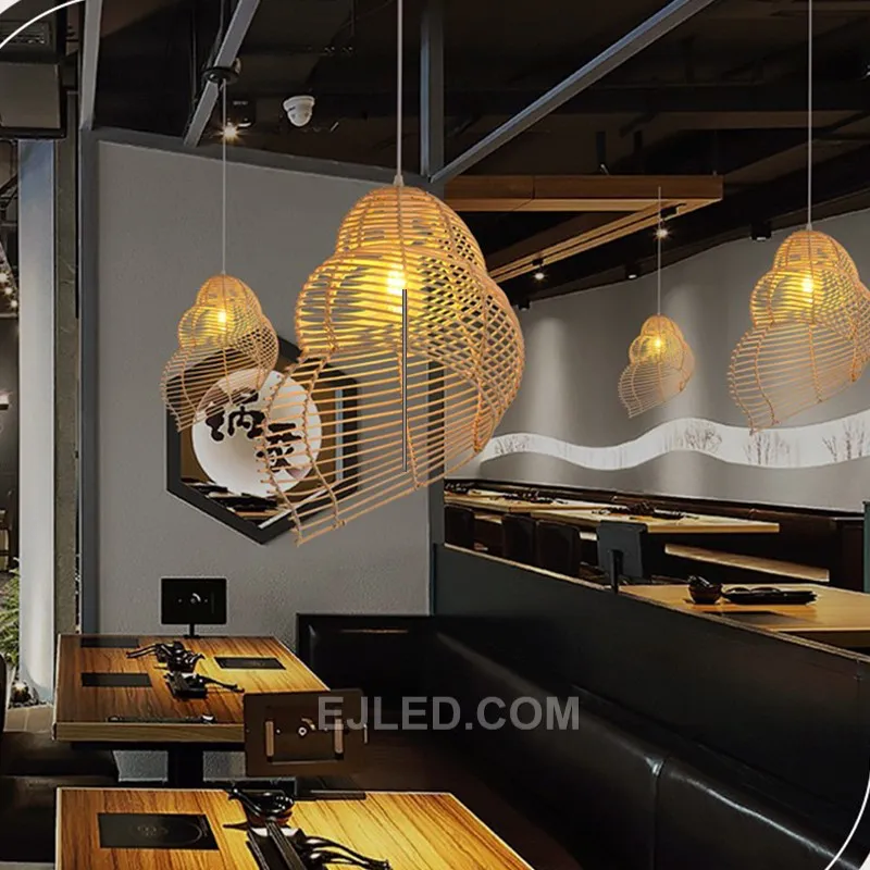 Formed from hand-woven bamboo, the RT0018 stands out with its distinctive conch-like spiral shape. This unique design offers both visual interest and practical downlighting. - view 3
