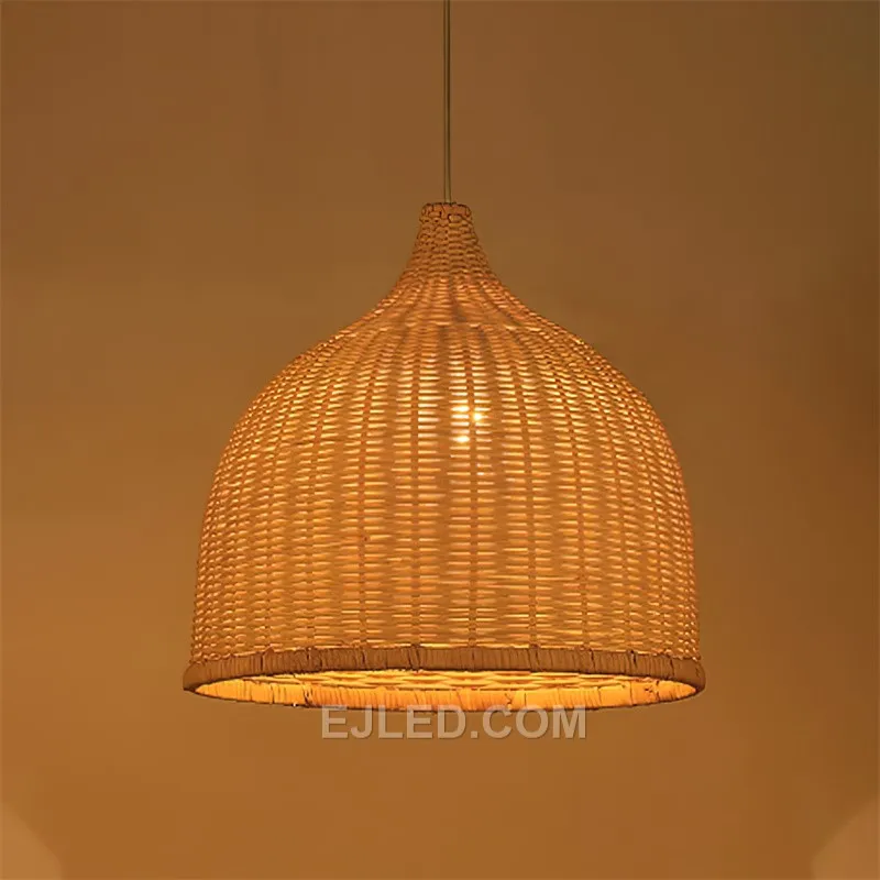 This bell-shaped rattan pendant directs light downwards through its open bottom rim. Its woven construction allows some ambient glow through the upper, looser weave, while the denser central section mitigates direct glare. - view 5