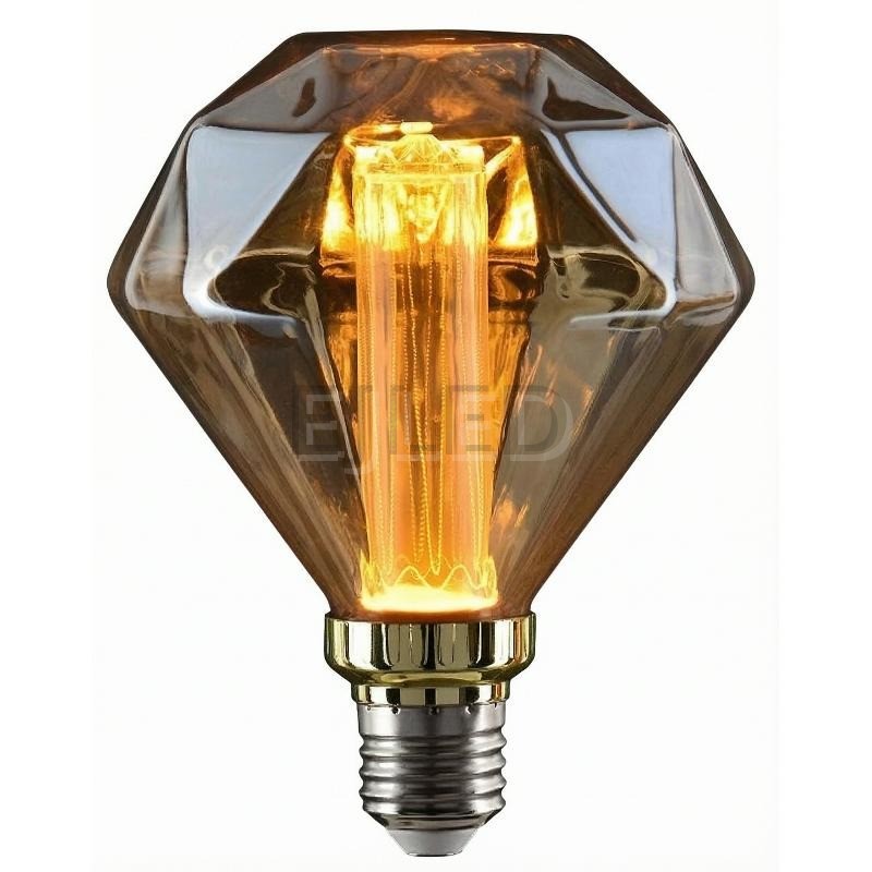 This amber glass light guide LED bulb features a geometric diamond shape with an upright cylindrical filament and a standard screw base.