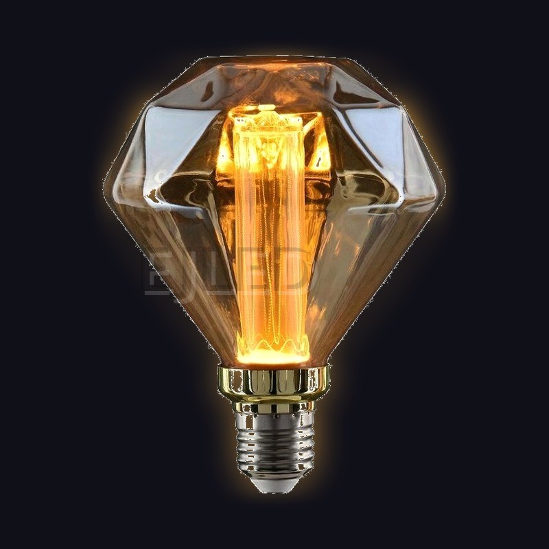 This amber glass light guide LED bulb features a geometric diamond shape with an upright cylindrical filament and a standard screw base. - view 2