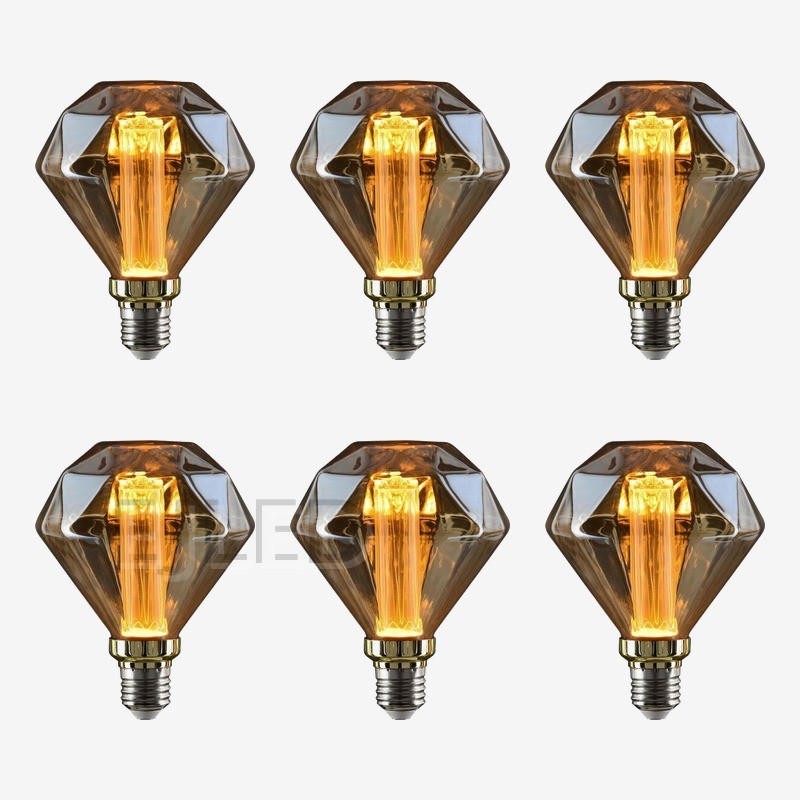 This amber glass light guide LED bulb features a geometric diamond shape with an upright cylindrical filament and a standard screw base. - view 5
