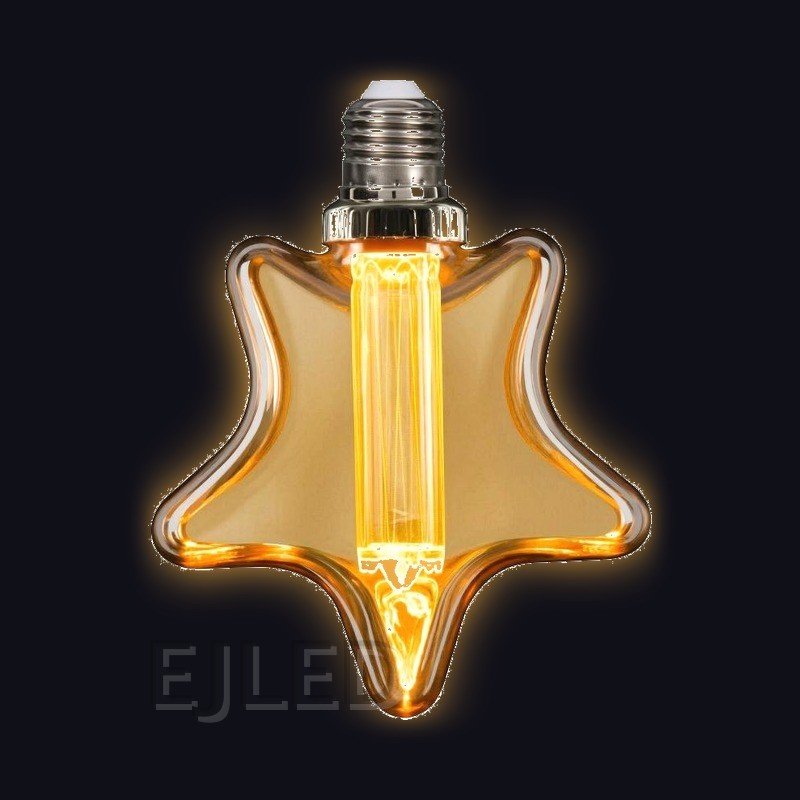 This star shaped amber glass light guide LED bulb combines vintage aesthetics with modern illumination, featuring a vertical central filament inside a decorative tinted shade. - view 2