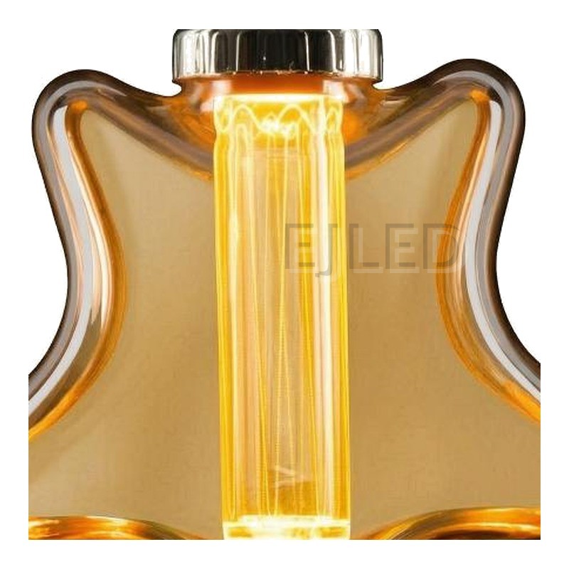 This star shaped amber glass light guide LED bulb combines vintage aesthetics with modern illumination, featuring a vertical central filament inside a decorative tinted shade. - view 3