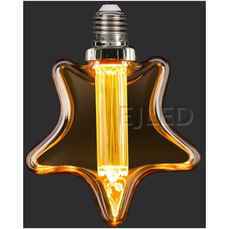 This star shaped amber glass light guide LED bulb combines vintage aesthetics with modern illumination, featuring a vertical central filament inside a decorative tinted shade. - view 6