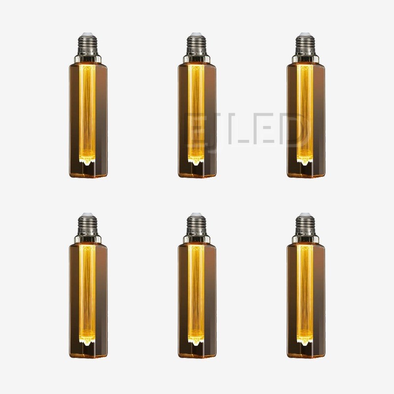 This amber glass rectangular tubular LED bulb features a vertical internal light guide filament. It connects with a standard screw base for decorative lighting fixtures. - view 5