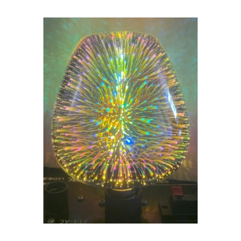 This clear glass 3D galaxy LED bulb features an enclosed pear-like shade with a colorful starburst light effect. It operates on a single E27 lamp base. - view 6