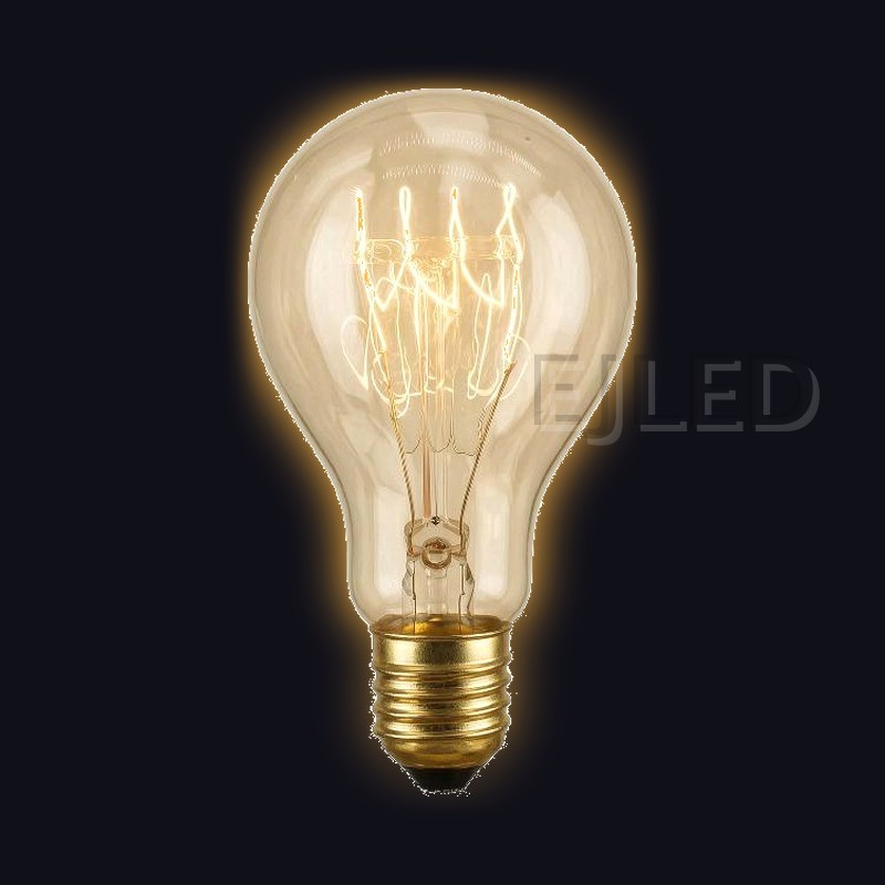 This amber glass retro light bulb features visible tungsten filaments inside a classic teardrop shaped enclosure, mounted on a brass threaded base. - view 2