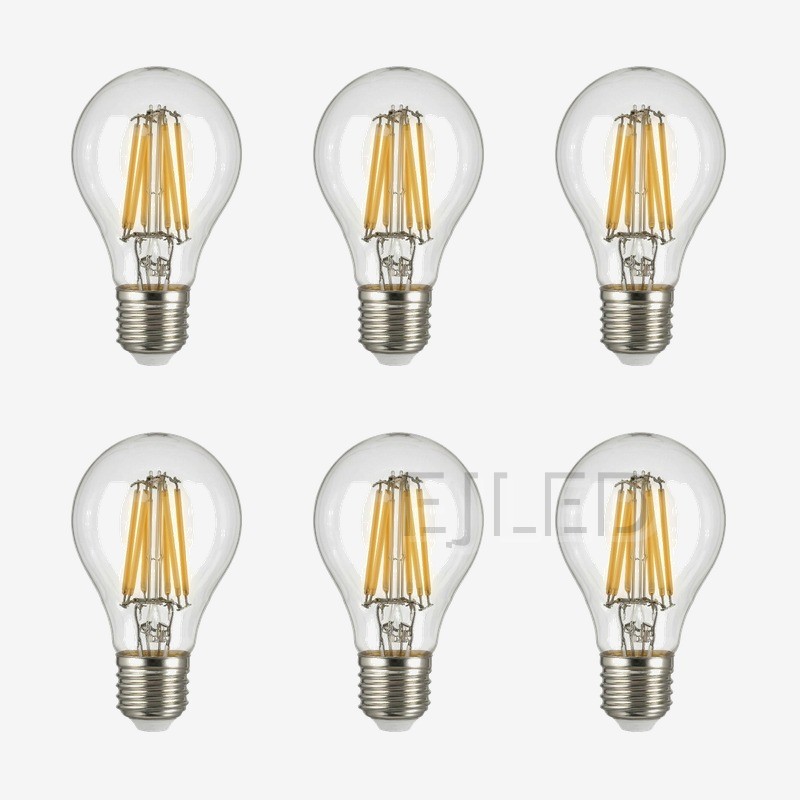This A60 glass light bulb features vertical soft filaments inside a clear pear-shaped glass envelope and a standard metal screw base. - view 5