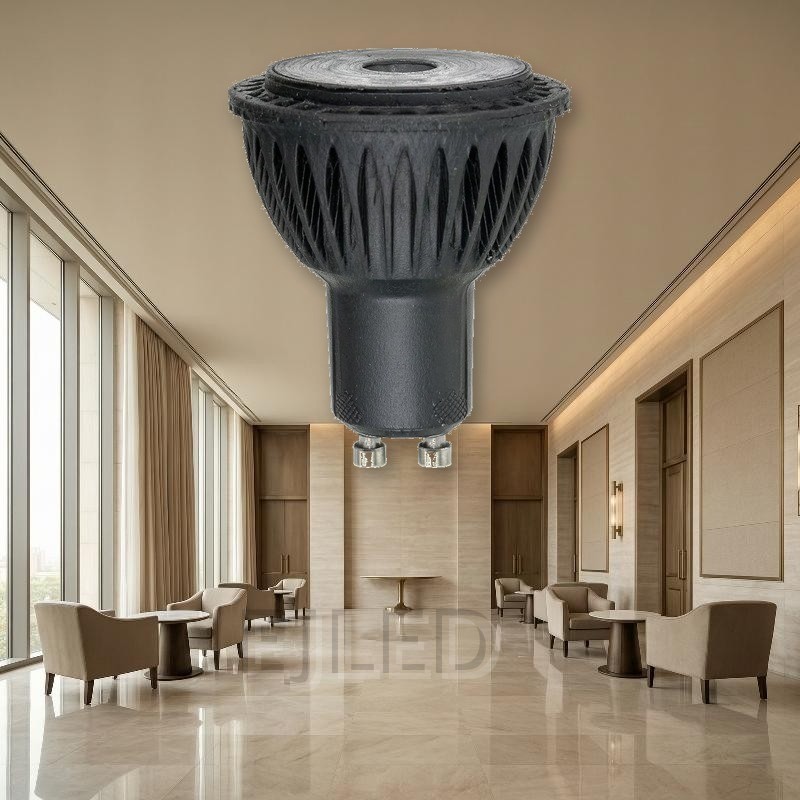 This compact brown black LED accessory lamp measures 50 by 58 millimeters and features a GU10 two-pin base for standard directional spotlight applications. - view 4