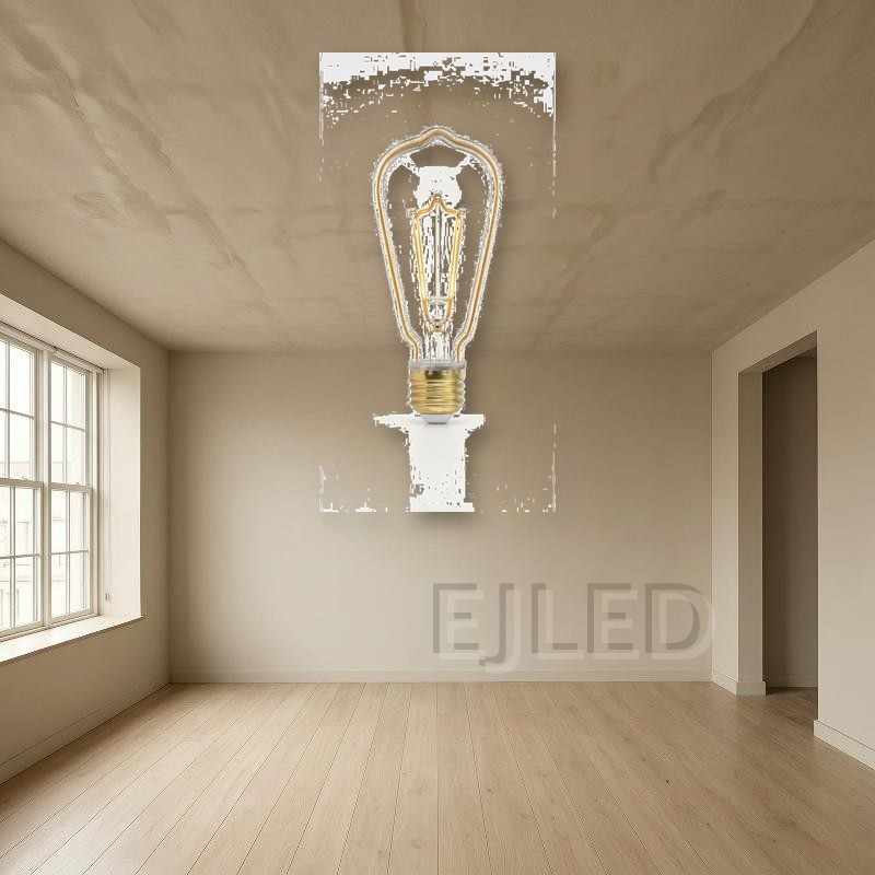 This clear glass ST64 bulb features an amber line LED filament inside a decorative pear-shaped glass envelope. It mounts with a standard threaded brass base for commercial lighting applications. - view 5