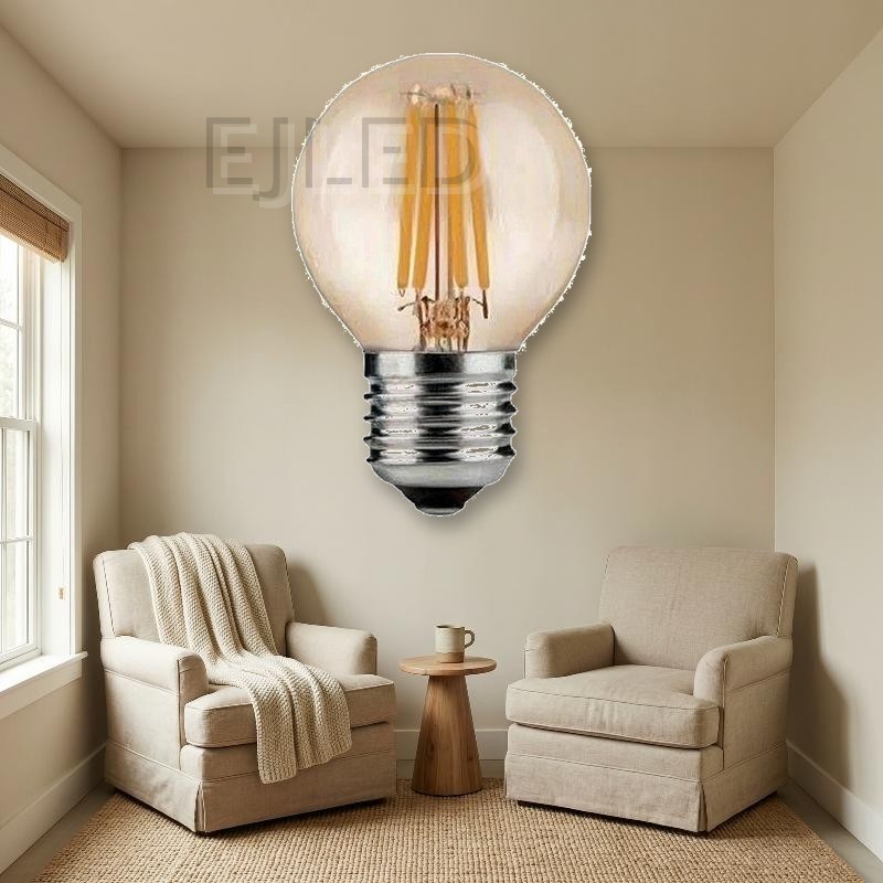 This compact globe lamp features vertical LED filaments inside a warm amber tinted glass sphere with a standard screw base, combining classic retro style with modern efficiency. - view 5