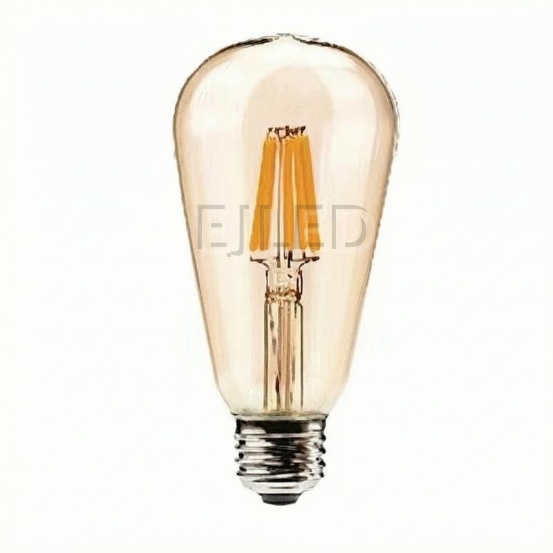 This clear glass teardrop lamp features visible LED filaments and a standard threaded metal screw base. It provides warm illumination for commercial and residential lighting projects.