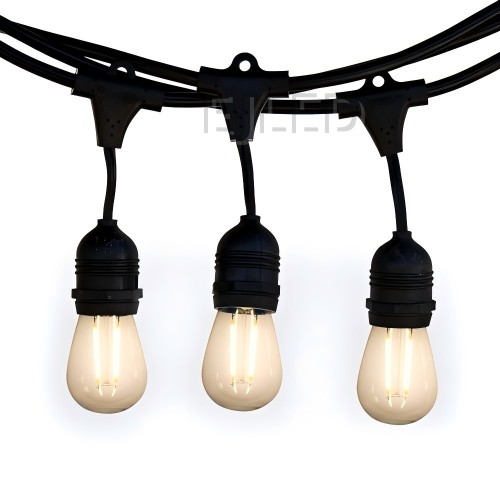 Outdoor dark blue plastic globe string lights featuring round white lamps suspended from a dark blue wire. Designed for exterior commercial and landscape decoration. - view 6