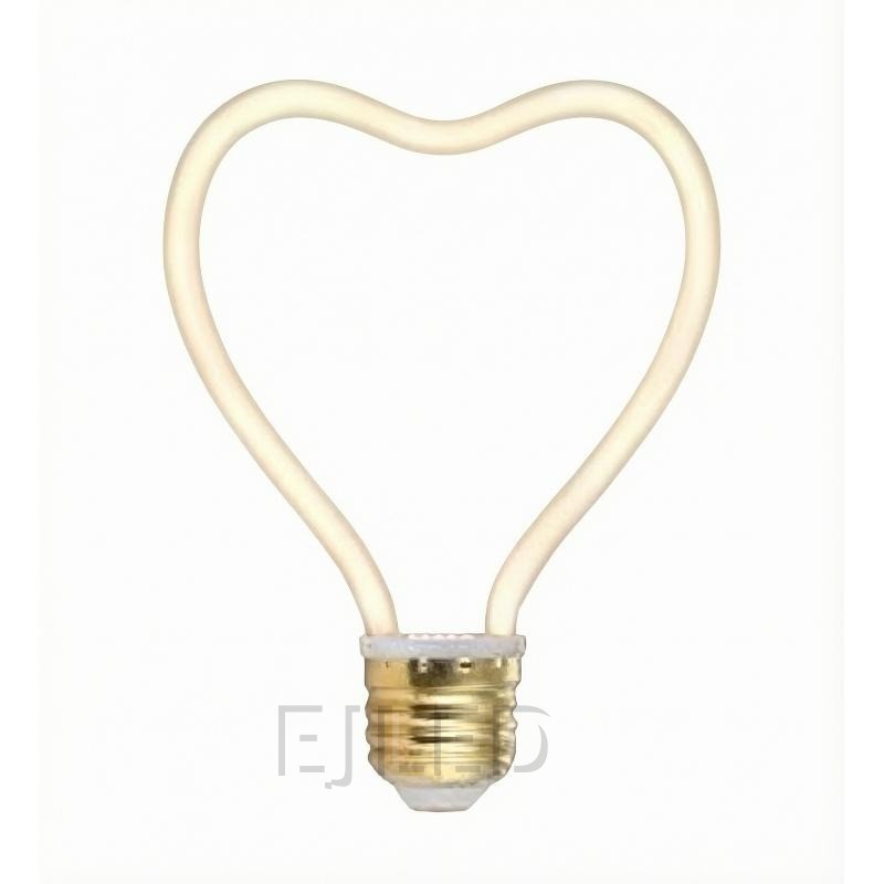 This heart shaped LED filament bulb features a flexible curved light source mounted on a standard metallic screw base.