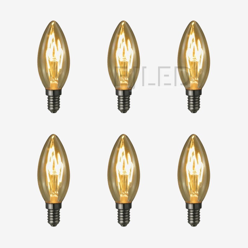 This candle shape soft filament LED bulb features an amber glass shade and vintage style lighting. It provides efficient illumination for commercial and residential decorative applications. - view 5