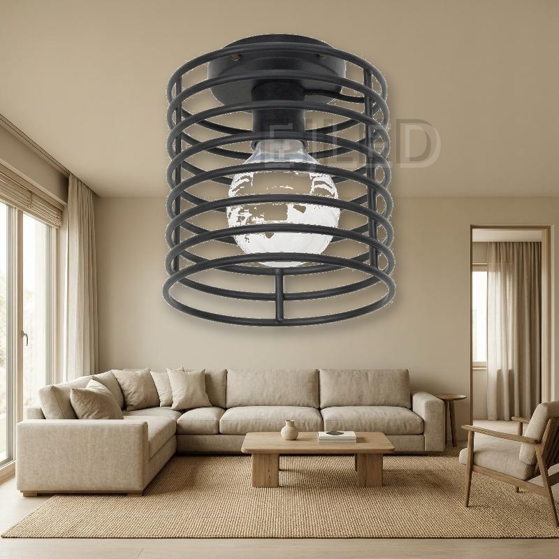 This black metal wire cage ceiling light features a cylindrical open shade and holds a single exposed globe bulb for commercial and residential spaces. - view 5