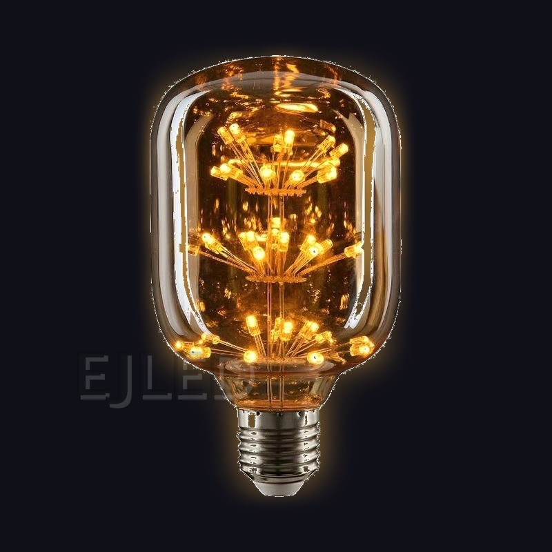 This amber glass starry LED bulb features multiple tiers of decorative interior lights inside a cylindrical glass shade with an Edison screw base. - view 2