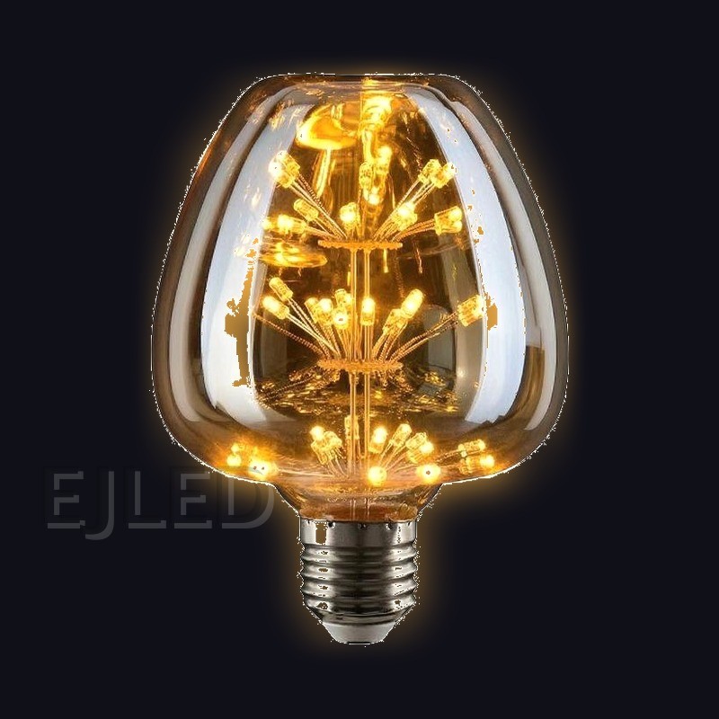 This amber glass decorative LED bulb features a distinctive multi-tier starburst filament arrangement inside a tinted shade with a standard metal screw base. - view 2