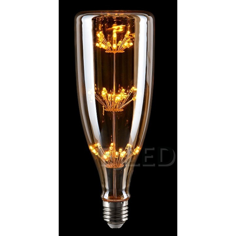 This clear glass starry LED bulb features a tall bottle shape and three vertical tiers of delicate firework style filaments connected to a standard screw base. - view 6